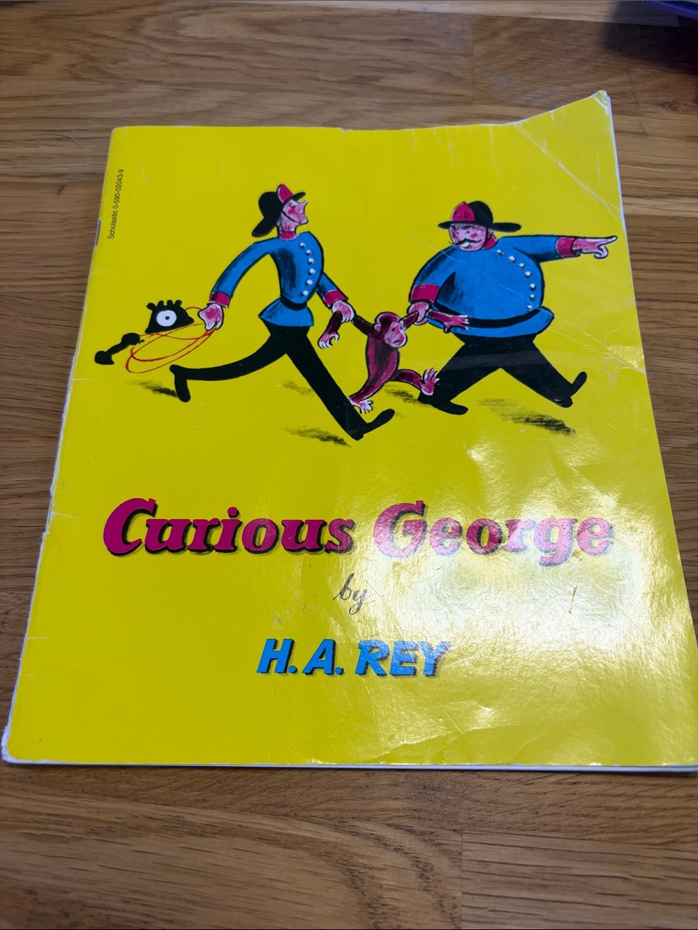 Curious George by H.A. Rey - Bright Yellow Illustrated Children's Book